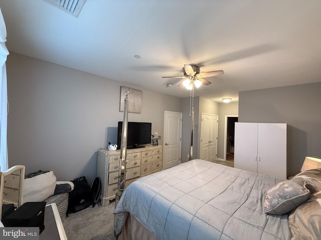 carpeted bedroom featuring ceiling fan