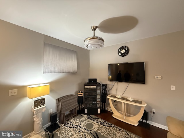 home office featuring wood finished floors and baseboards