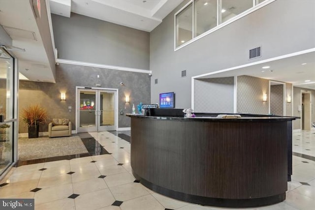 reception featuring french doors and visible vents