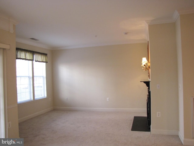 unfurnished living room featuring light carpet, baseboards, visible vents, and crown molding