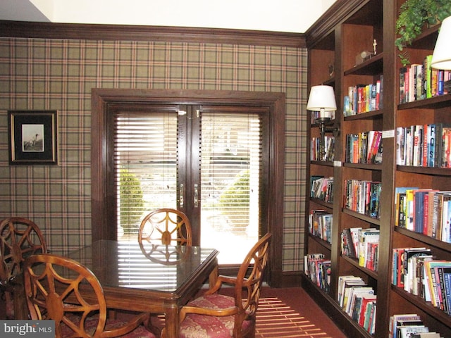 dining room featuring wallpapered walls and french doors