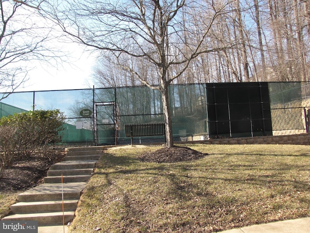 exterior space with a gate and fence