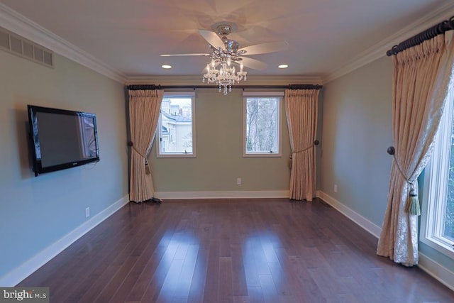 unfurnished room with visible vents, baseboards, dark wood-style flooring, and crown molding