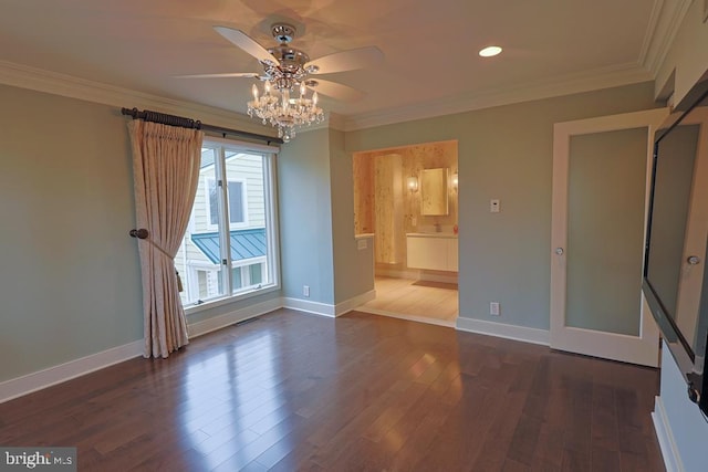 unfurnished room featuring ceiling fan, dark wood-style floors, baseboards, and ornamental molding