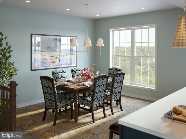 dining room featuring recessed lighting and baseboards