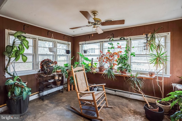 sunroom / solarium with ceiling fan