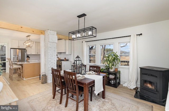 dining area with light wood-type flooring