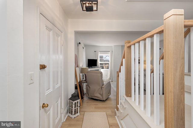 interior space with stairs and light wood finished floors