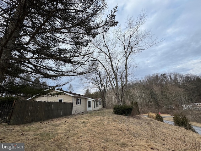 view of yard with fence