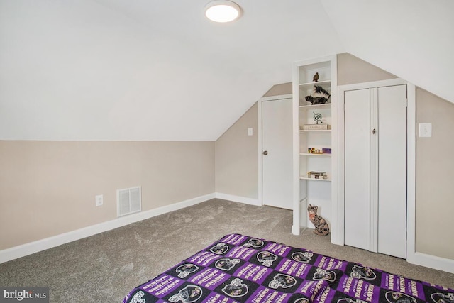 bonus room featuring lofted ceiling, baseboards, visible vents, and carpet flooring