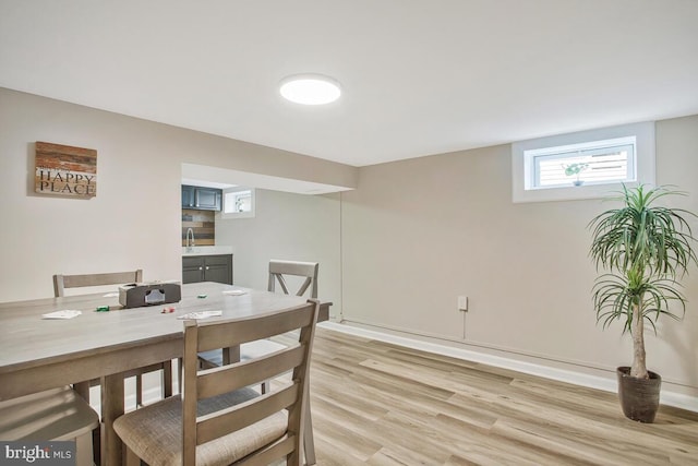 dining room with light wood-style floors