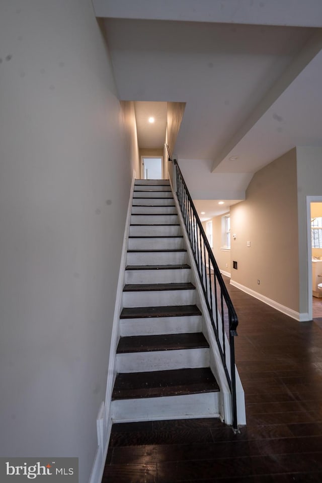 stairs featuring hardwood / wood-style floors, recessed lighting, and baseboards