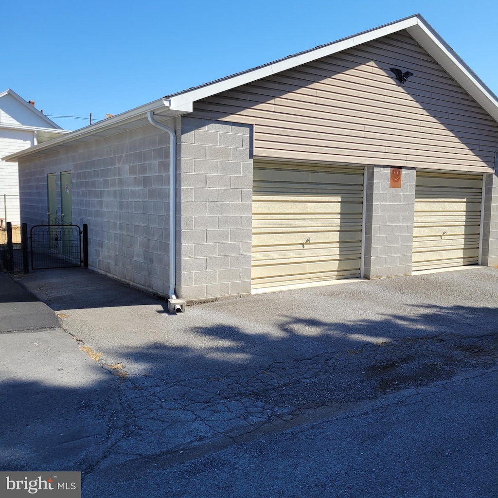 garage featuring a gate