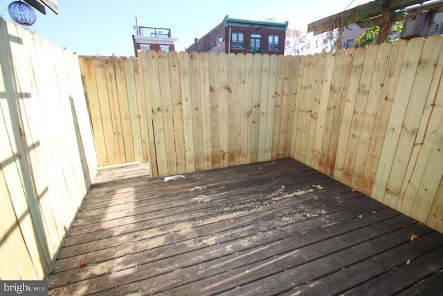 wooden deck featuring fence