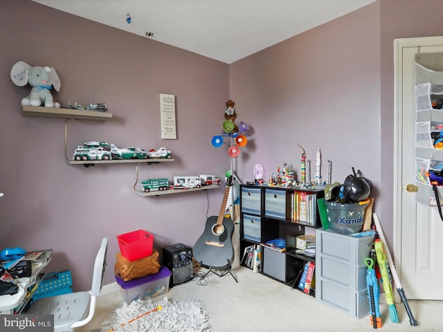 playroom featuring carpet flooring