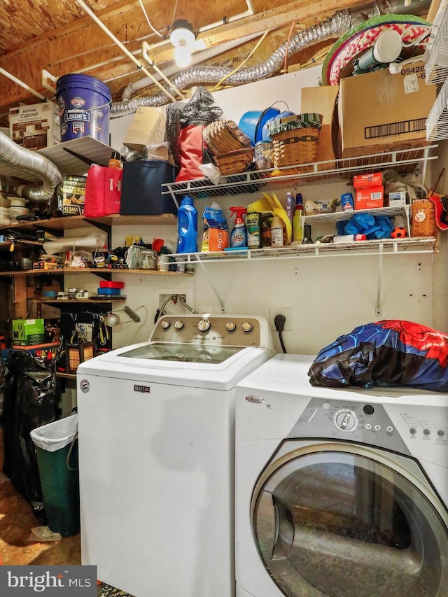 laundry room with washing machine and dryer and laundry area