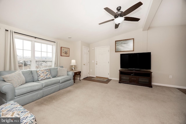 living area with lofted ceiling with beams, carpet, baseboards, and a ceiling fan