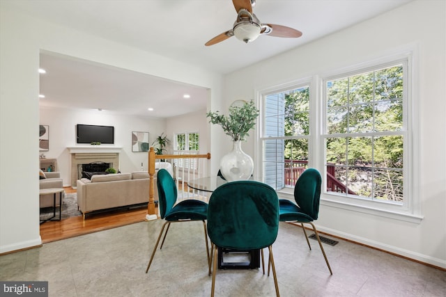 1729 Hutchinson Ln, Silver Spring, MD 20906 - dining room with baseboards, ceiling fan, recessed lighting, and a fireplace
