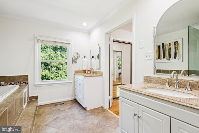 1729 Hutchinson Ln, Silver Spring, MD 20906 - full bath featuring crown molding, two vanities, tiled bath, tile patterned floors, and baseboards