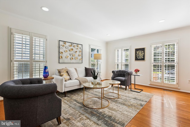 1729 Hutchinson Ln, Silver Spring, MD 20906 - living room with ornamental molding, light wood finished floors, recessed lighting, and baseboards