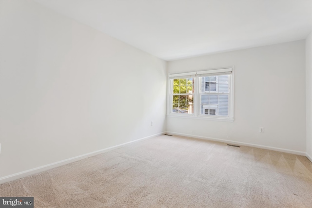 1729 Hutchinson Ln, Silver Spring, MD 20906 - carpeted empty room with baseboards