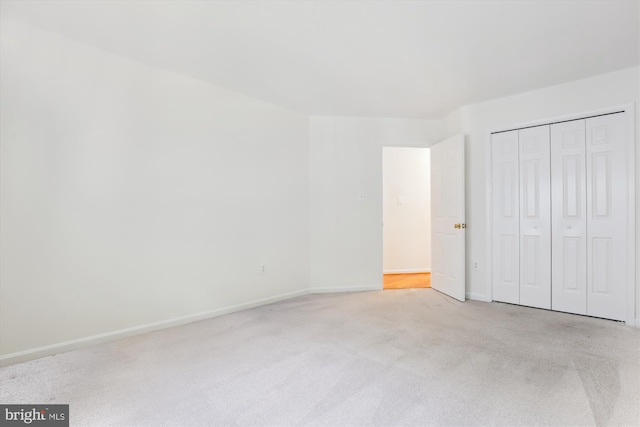1729 Hutchinson Ln, Silver Spring, MD 20906 - unfurnished bedroom with carpet flooring, baseboards, and a closet