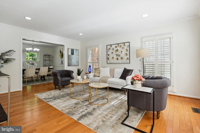 1729 Hutchinson Ln, Silver Spring, MD 20906 - living area with a chandelier, hardwood / wood-style floors, crown molding, recessed lighting, and baseboards