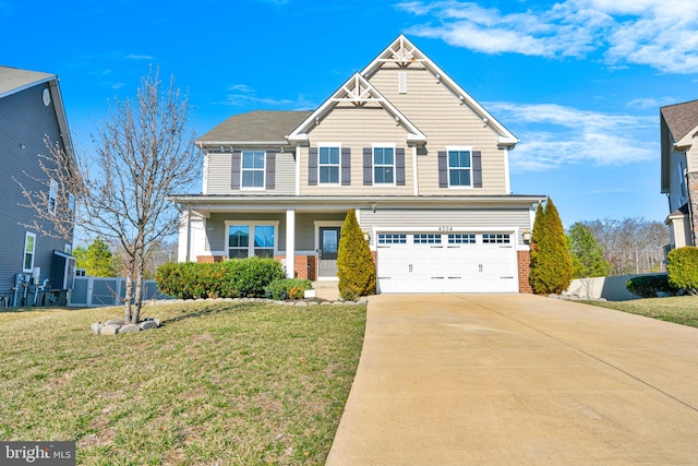 view of front of house with a front lawn, fence, a porch, a garage, and driveway