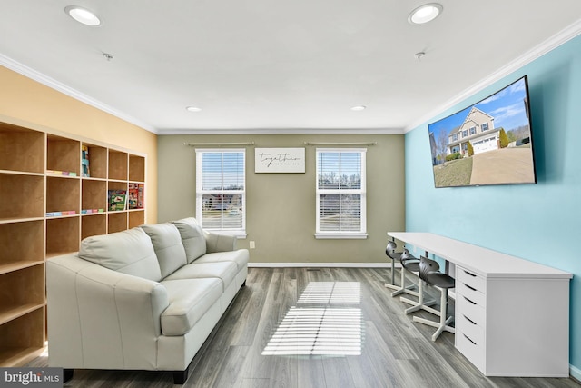 office area featuring recessed lighting, crown molding, baseboards, and wood finished floors