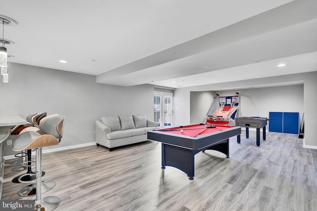 playroom with recessed lighting, baseboards, and wood finished floors