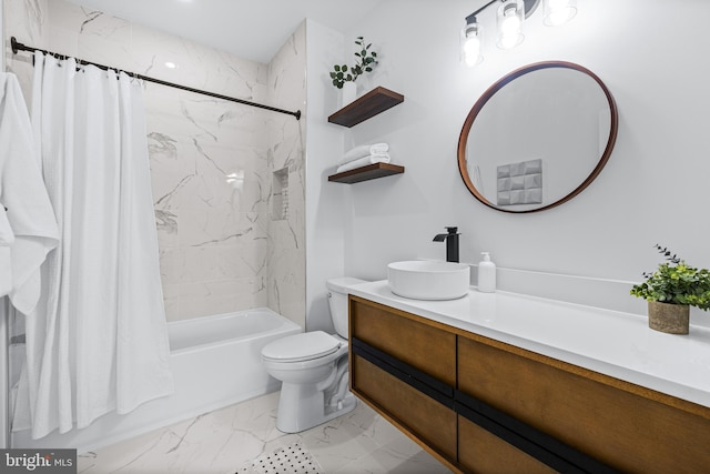 bathroom with toilet, marble finish floor, shower / bath combo, and vanity