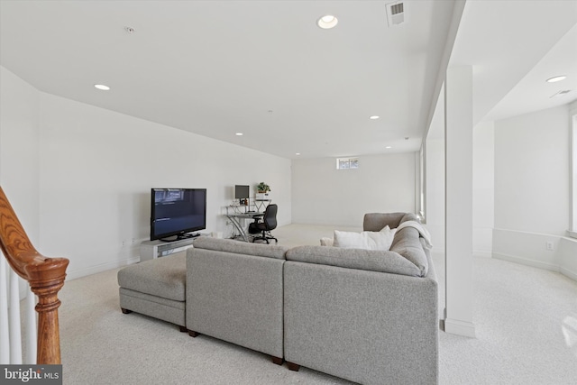 living room with light carpet, visible vents, recessed lighting, and baseboards