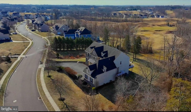 drone / aerial view with a residential view