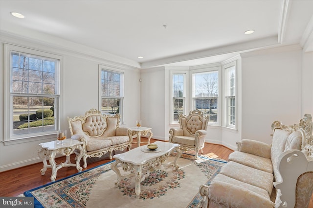 living room with recessed lighting, wood finished floors, and baseboards