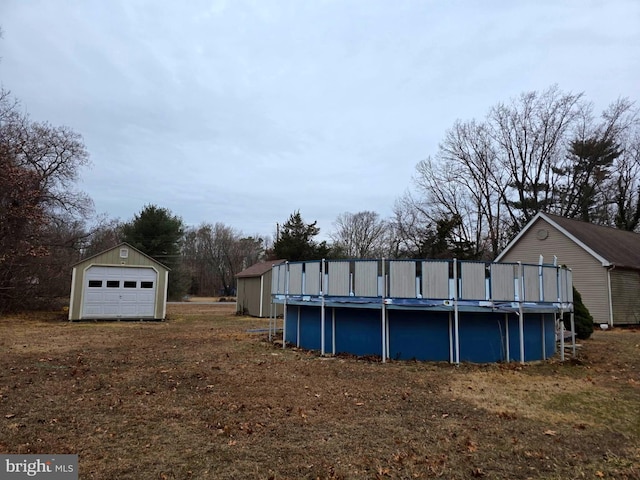 pool featuring an outbuilding