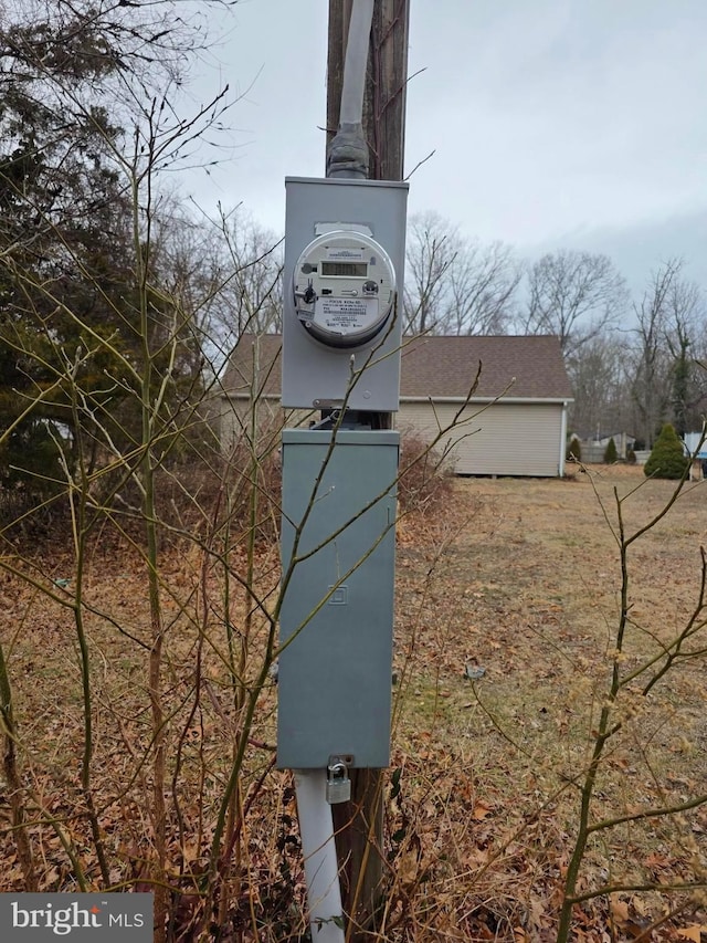 details featuring a wood stove and electric meter