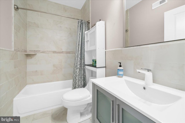 full bath with tasteful backsplash, visible vents, toilet, shower / bathtub combination with curtain, and tile walls