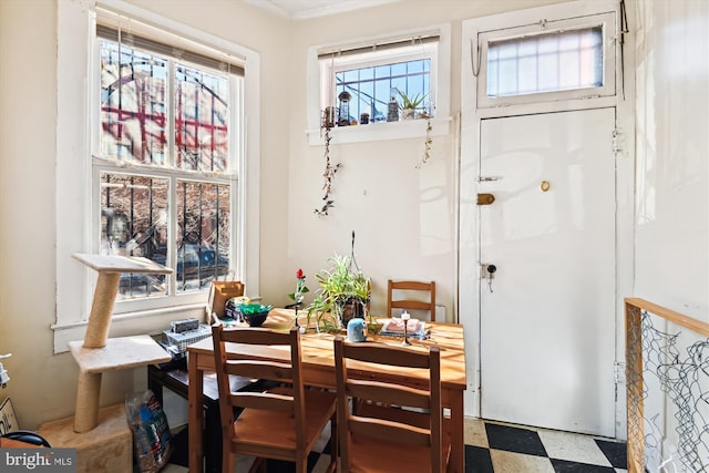 dining space with tile patterned floors