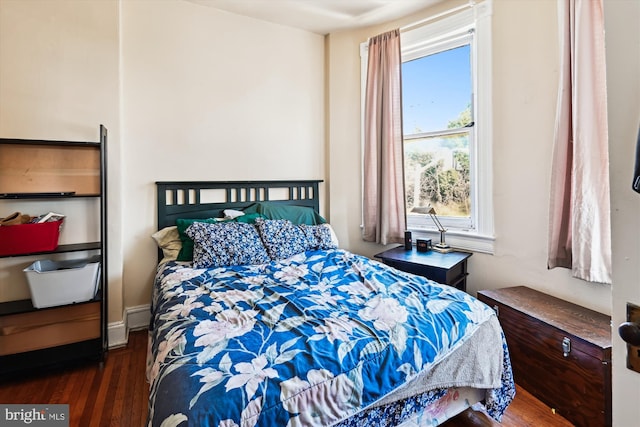 bedroom featuring wood finished floors