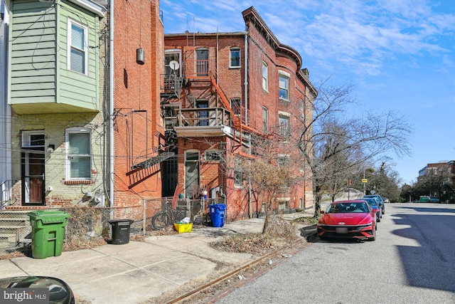 view of property featuring fence