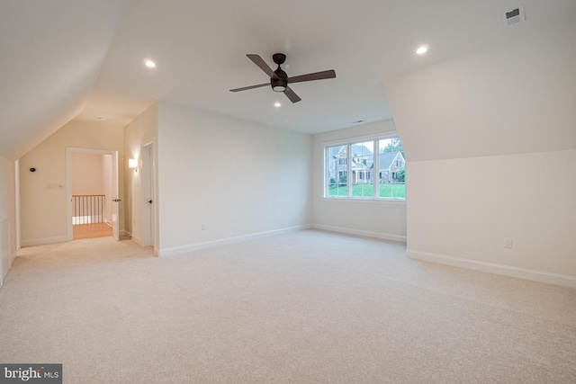 bonus room with recessed lighting, lofted ceiling, visible vents, light carpet, and baseboards