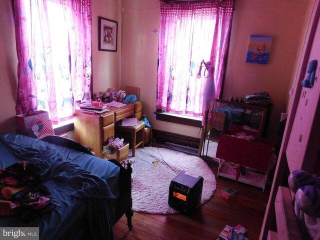 bedroom featuring hardwood / wood-style floors