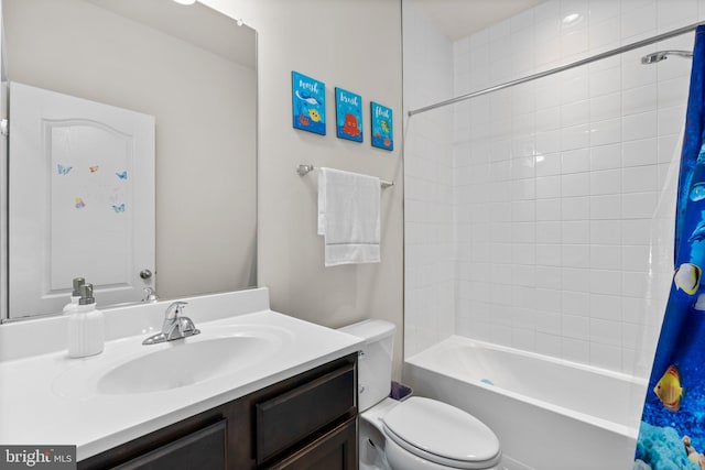 full bathroom featuring shower / bathtub combination with curtain, vanity, and toilet