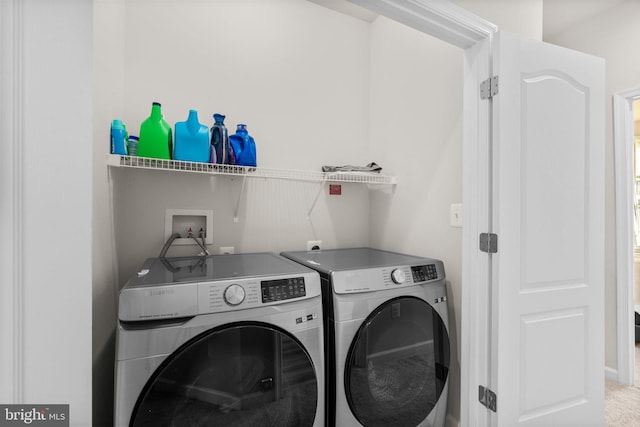 laundry area with laundry area and washing machine and dryer