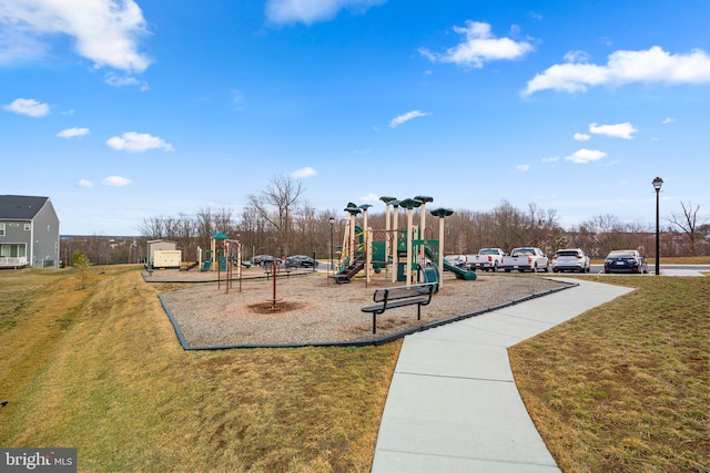 communal playground with a lawn