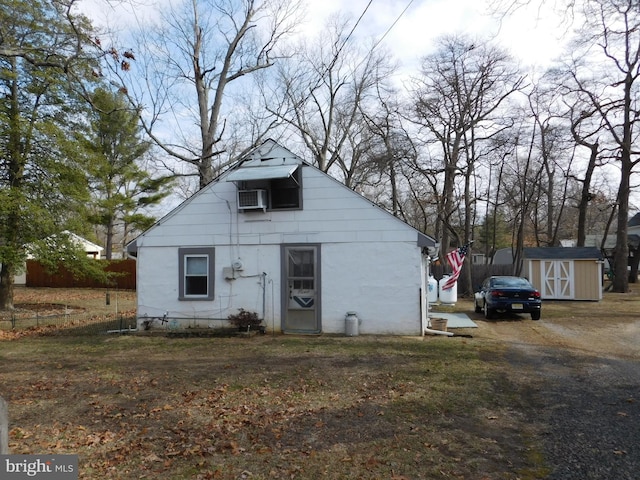 view of shed featuring driveway