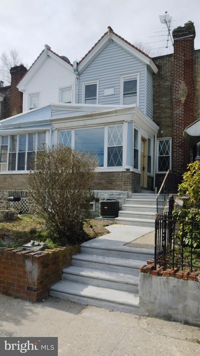 view of front of property featuring central AC