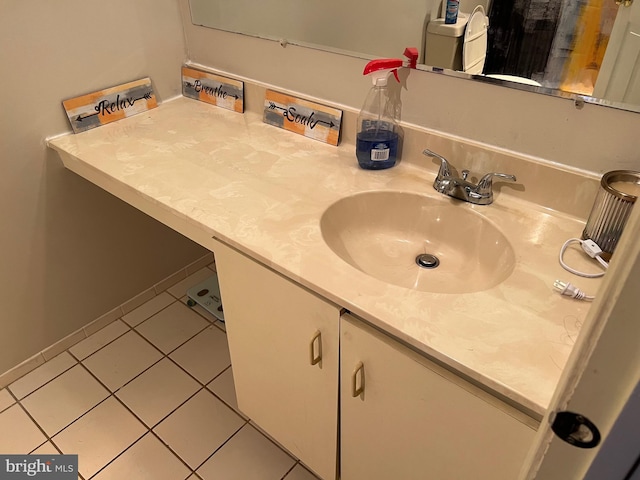 bathroom featuring tile patterned floors and vanity