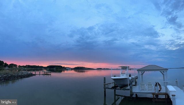 view of dock with a water view and boat lift