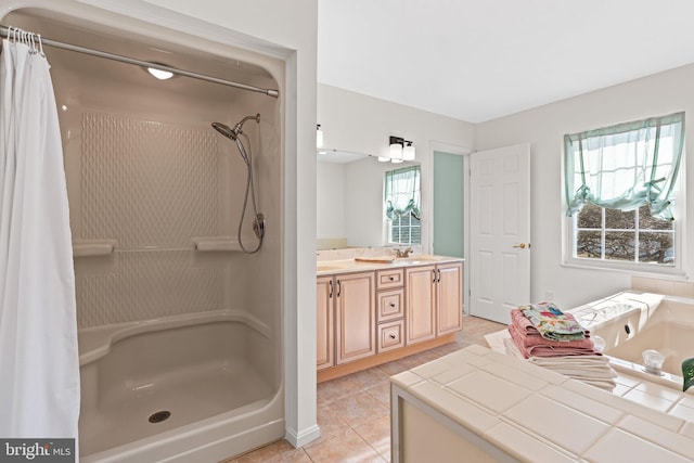 full bath featuring a shower with shower curtain, a whirlpool tub, double vanity, and a sink